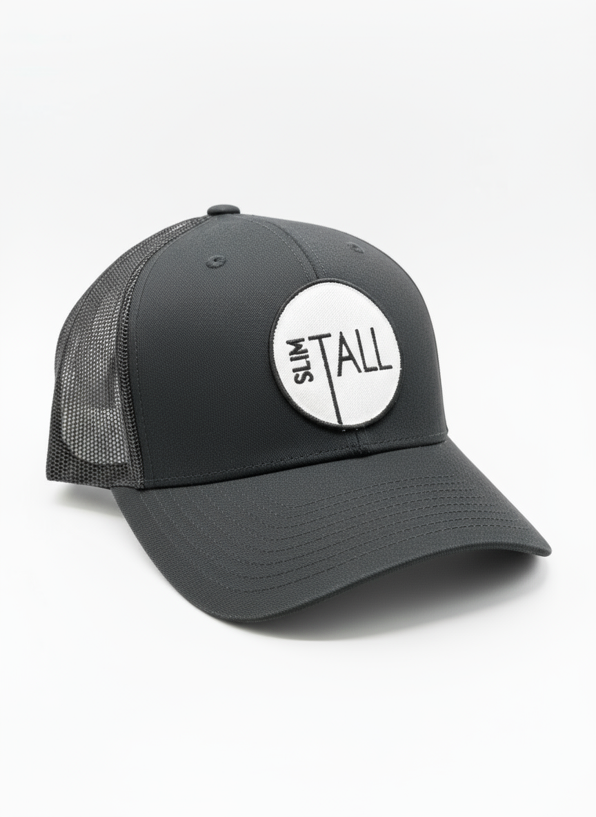 A black and white trucker hat with the text 'SlimTALL' printed in white on the front.