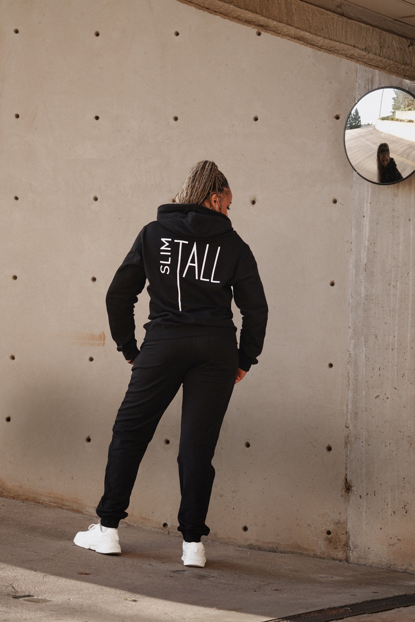 SlimTall black and white tracksuit set, back with embroidered logo. Model is 5'11" wearing size L