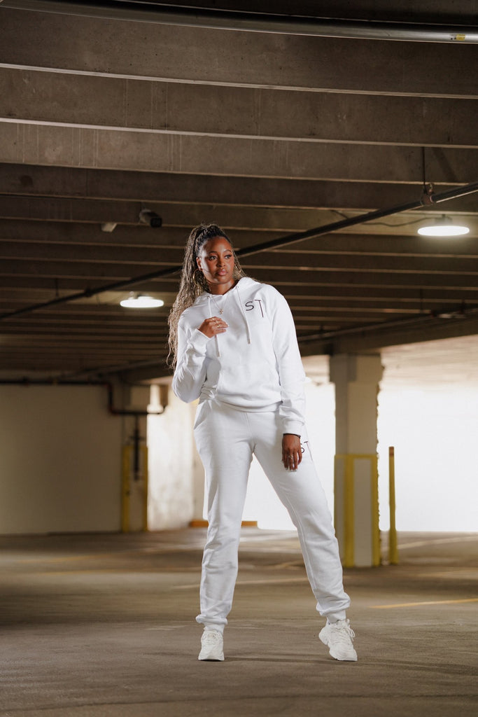 SlimTall white tracksuit set, front. Model is 5'11" wearing size L